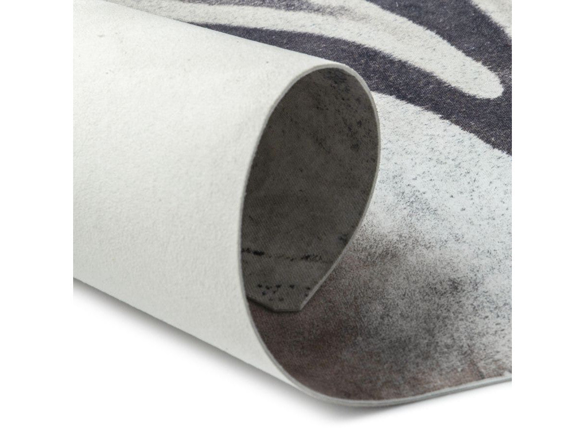Tapis effet peau de bête ZELIE motif zèbre