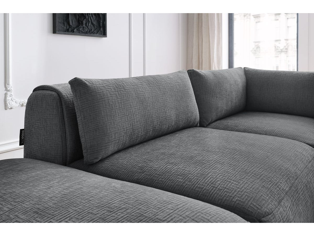 Canapé d'angle fixe modulable JEANNE tissu texturé avec 2 chauffeuses, 1 angle et 2 poufs