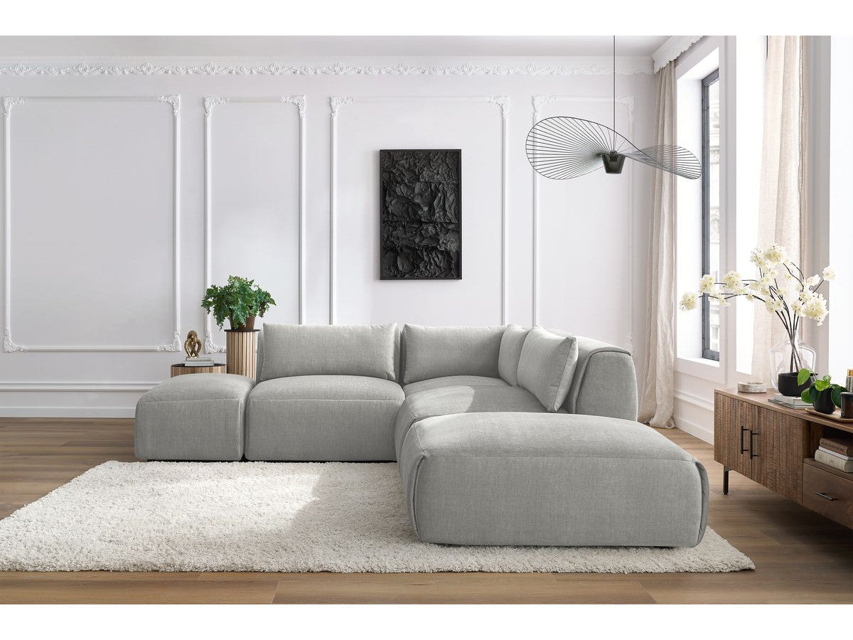 Canapé d'angle fixe modulable JEANNE tissu velours avec 2 chauffeuses, 1 angle et 2 poufs