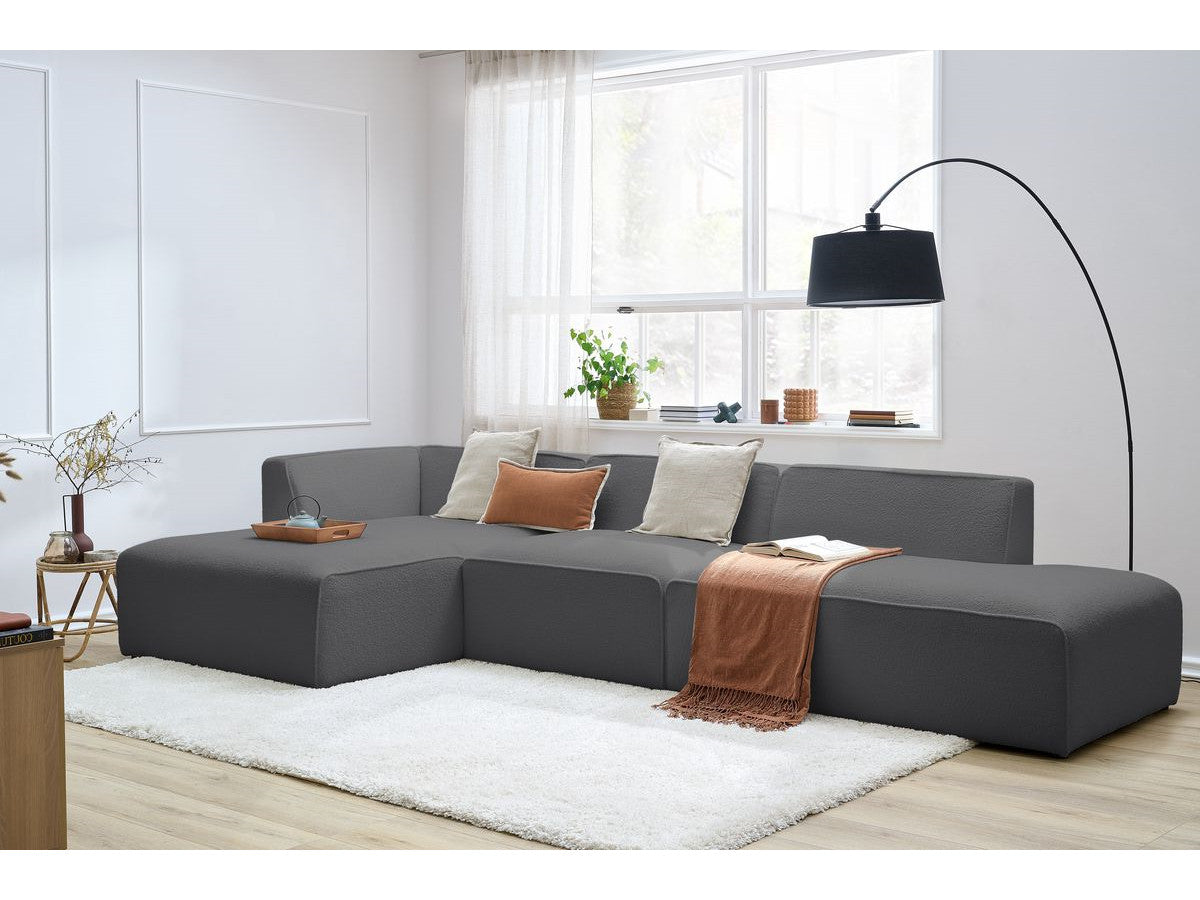 Canapé d'angle fixe modulable MEGEVE tissu bouclette avec 1 chauffeuse et 1 pouf