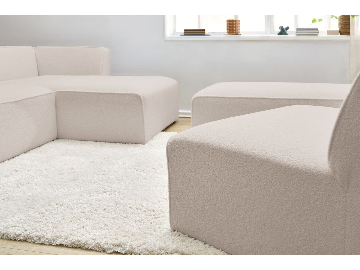 Canapé d'angle fixe modulable MEGEVE tissu bouclette avec 1 chauffeuse et 1 pouf