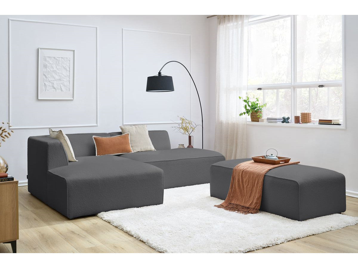 Canapé d'angle fixe modulable MEGEVE tissu bouclette avec pouf