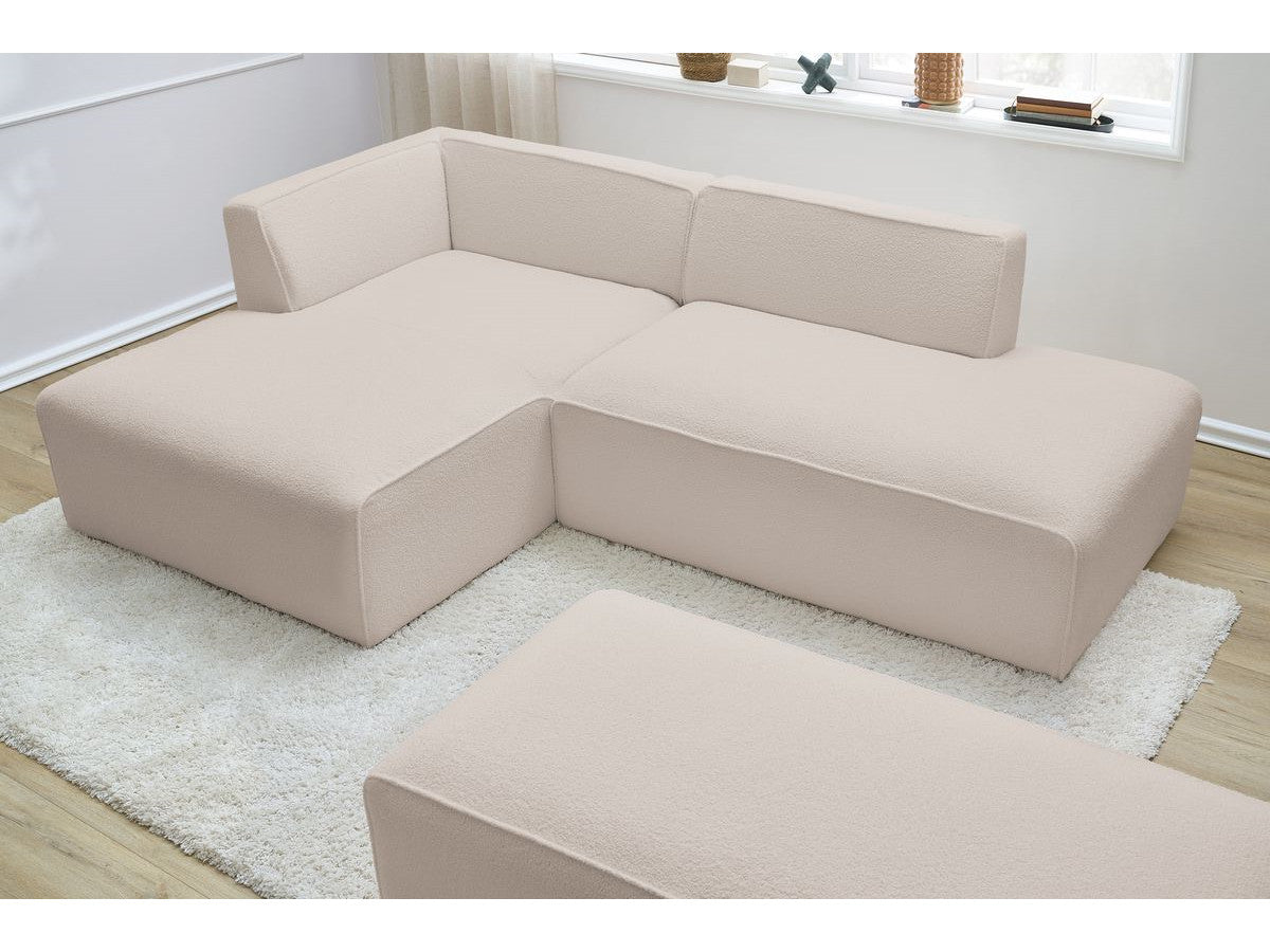 Canapé d'angle fixe modulable MEGEVE tissu bouclette avec pouf