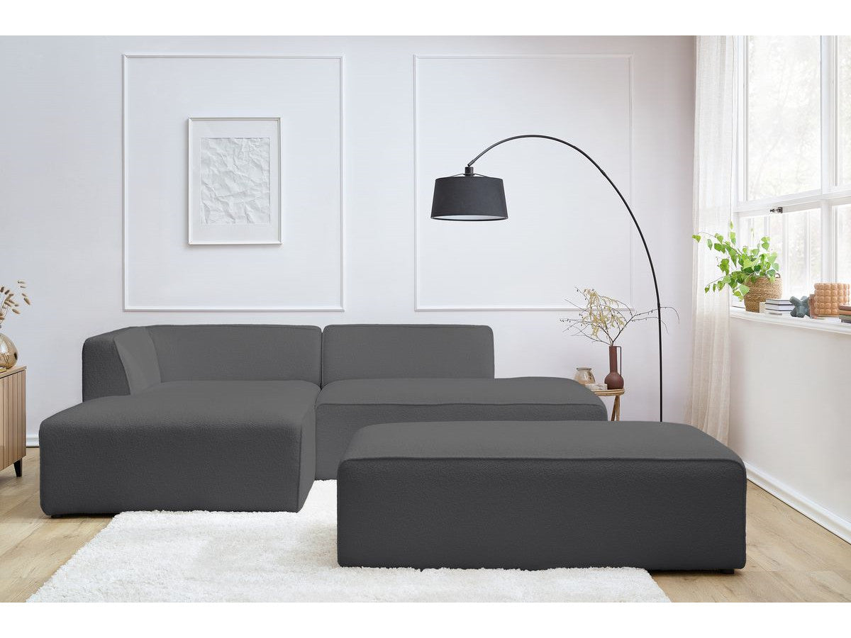 Canapé d'angle fixe modulable MEGEVE tissu bouclette avec pouf