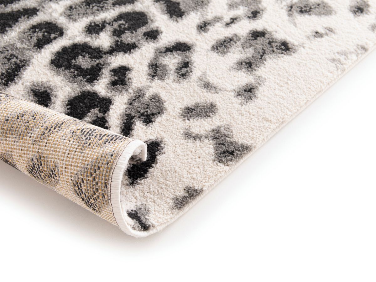 Tapis poils ras MERYL motif léopard - Imprimé léopard noir