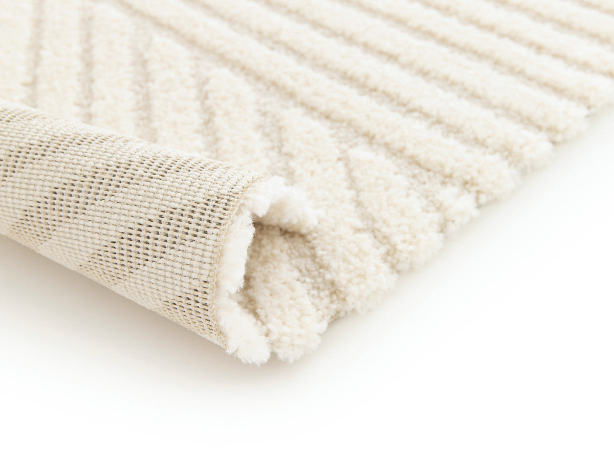 Tapis poils ras OLIVIER motif abstrait - Beige