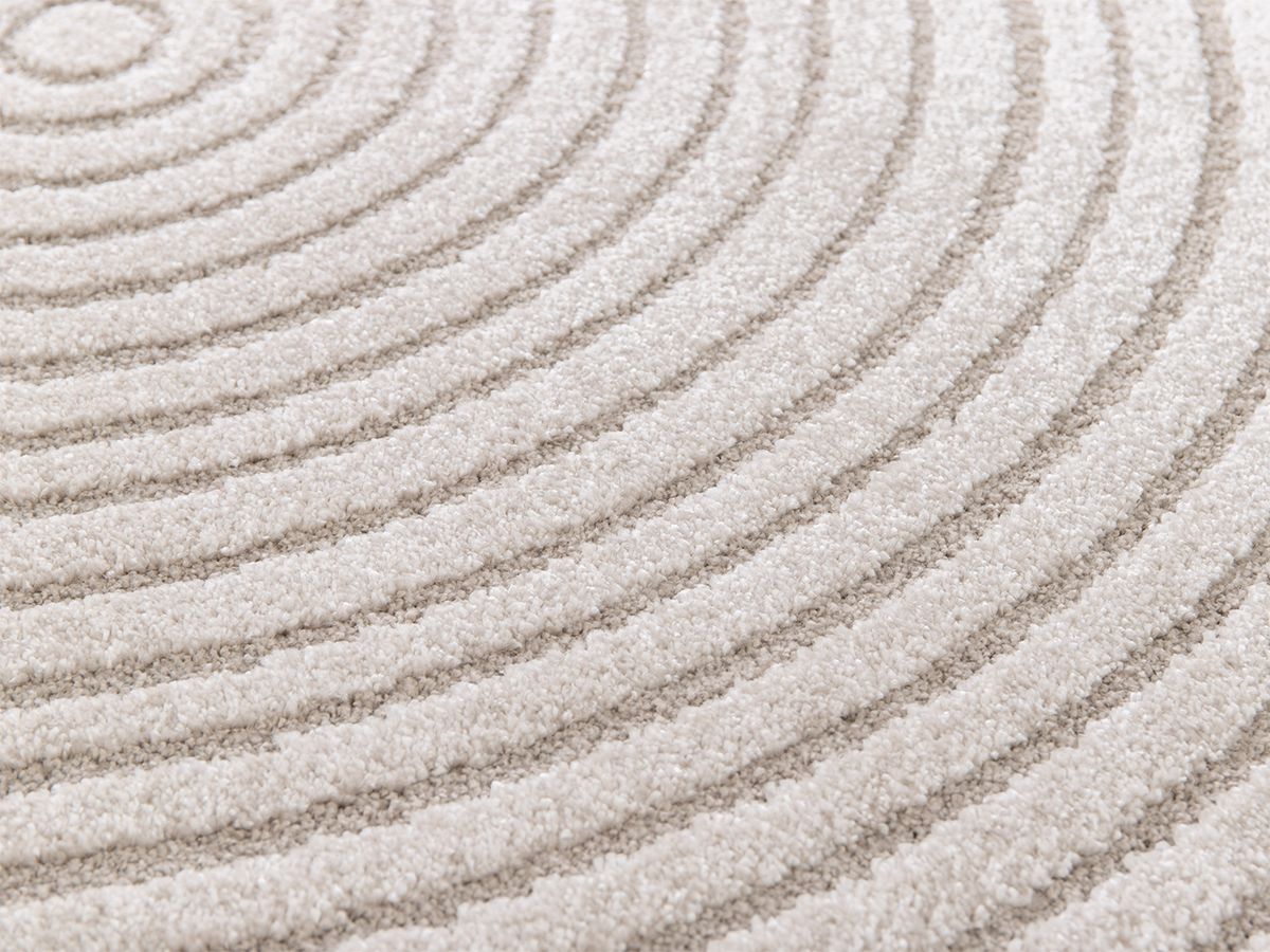 Tapis rond poils ras ONDELIA motif géométrique - Beige